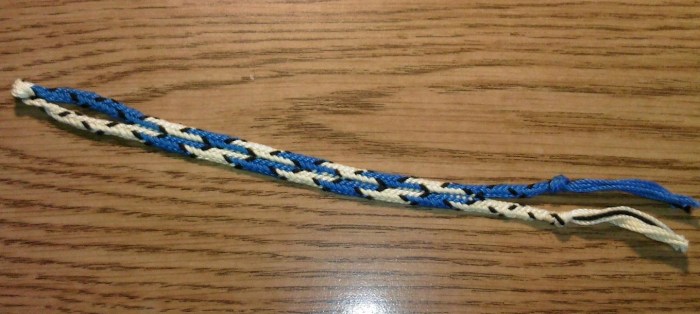 Dan Gaiser's 7-loop spanish braid. 6 bicolor loops and 1 black loop. 