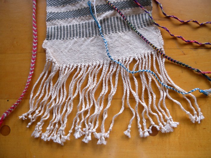 2-loop braids, and a weaving with a fringe of 2-loop braids. Fingerloop braids, loopbraider.com