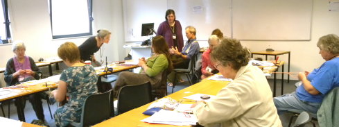 Ingrid Crickmore's finger loop braiding class at Braids 2012