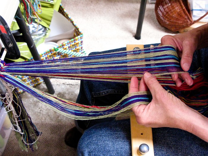 Photo of hand-held loop braiding with 64 loops, counter-twining.