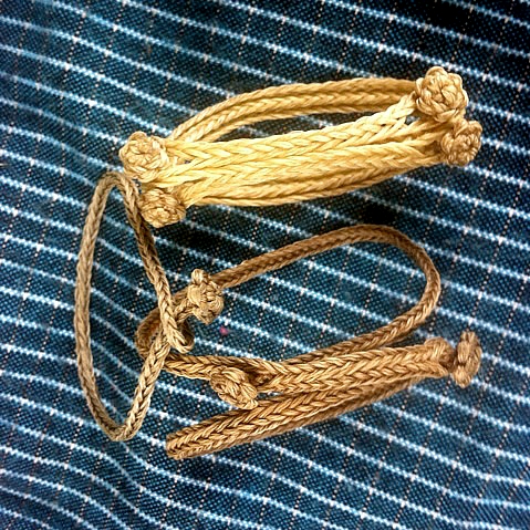 fingerloop braided bracelets by Dominic Taylor, waxed leatherworking thread