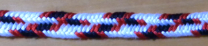 Flat 7-loop bicolor zig-zag fingerloop braid, loopbraider.com