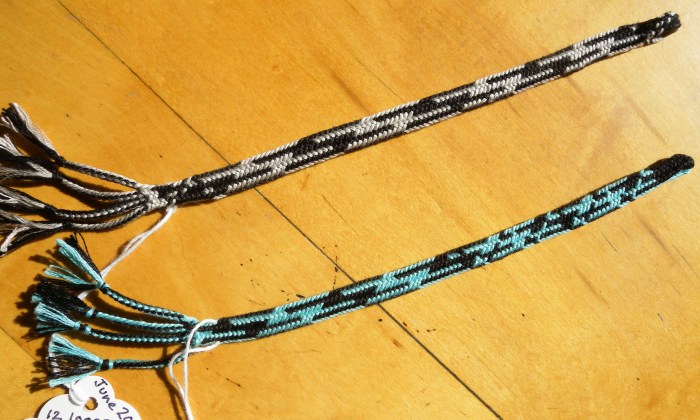 2-tubes shape variation of the 5-transfer braid. These braids have 3 turned loop transfers and 2 straight (open, unreversed) loop transfers.  This shape variation has very asymmetrical bicolor loop color-patterns.  Original braid structure, loopbraider.com