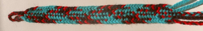 Replica of Iron Age fingerloop braid from Hallstatt Salt Mines, HallTex 301, color pattern as shown in schematic diagrams of study. Wool weaving yarn. loopbraider.com